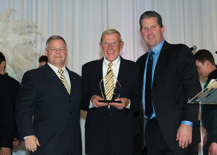 From left, Servite president, Pete Bowen '82, legendary Notre Dame coach, Lou Holtz, and retired NFL quarterback, Steve Beuerlein '83 at Servite's 8th Annual Excellence in Leadership Dinner.